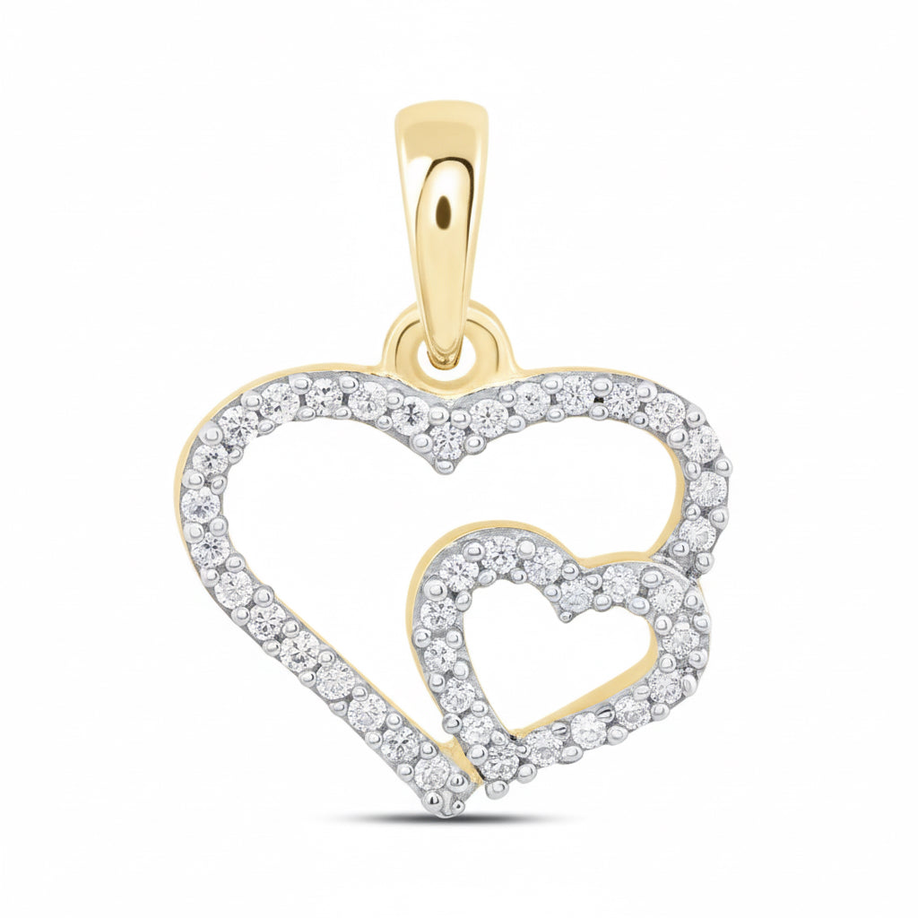 Gold and silver heart-shaped pendant on a white background