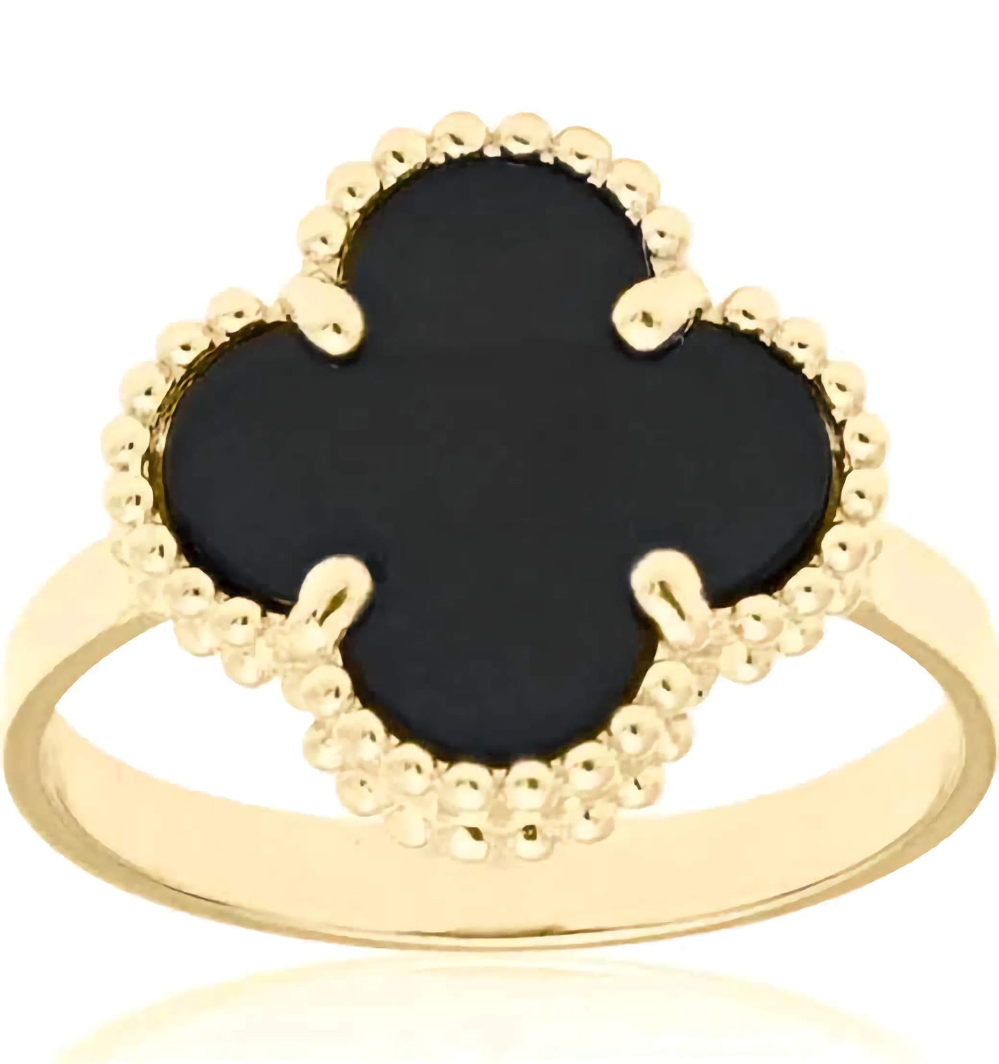 A 10K yellow gold ring with a clover-shaped design, featuring a black stone in the center, surrounded by small gold beads on the shank.