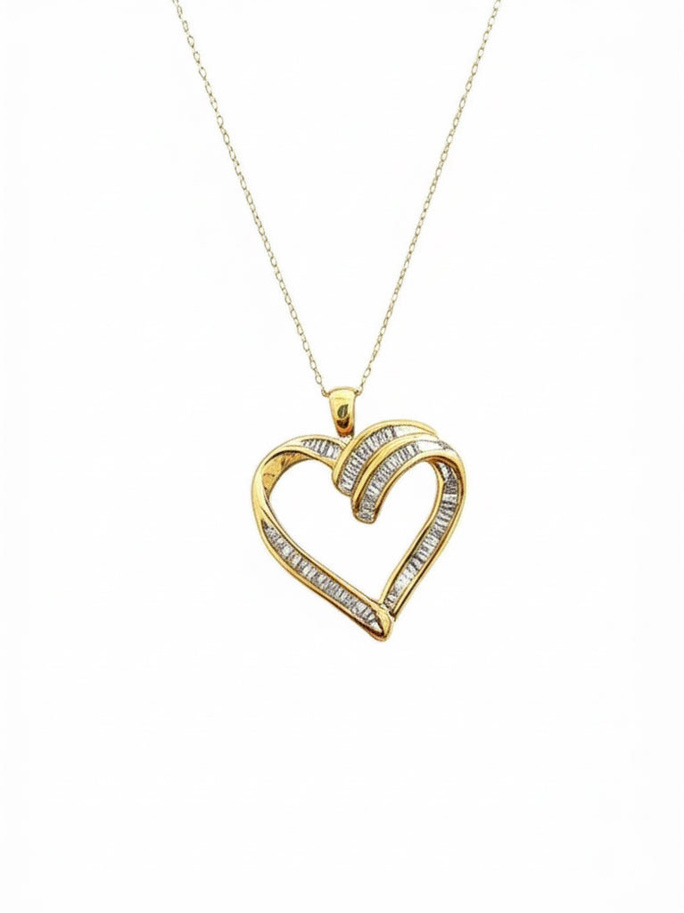 10K gold heart-shaped charm with baguette-cut diamonds and 18-inch chain