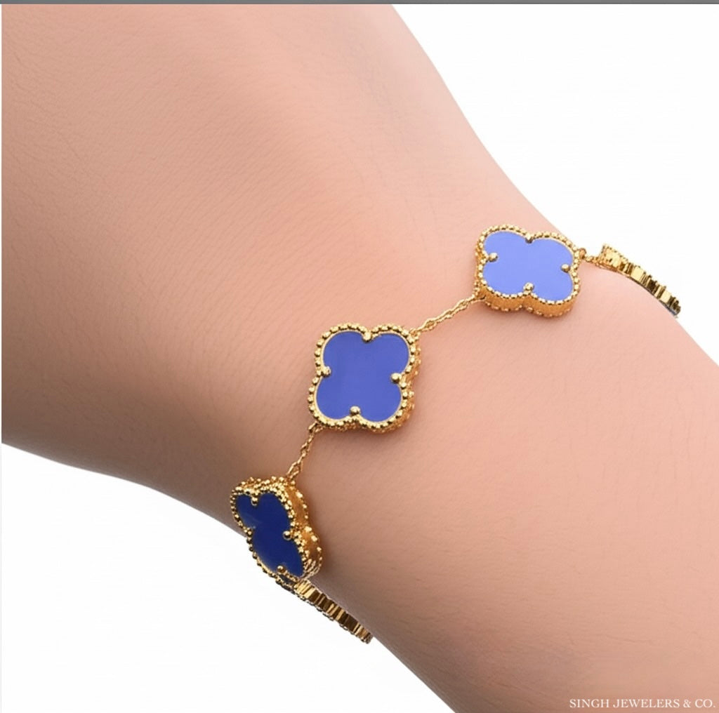 10K gold bracelet with blue enamel clover charm and adjustable fit