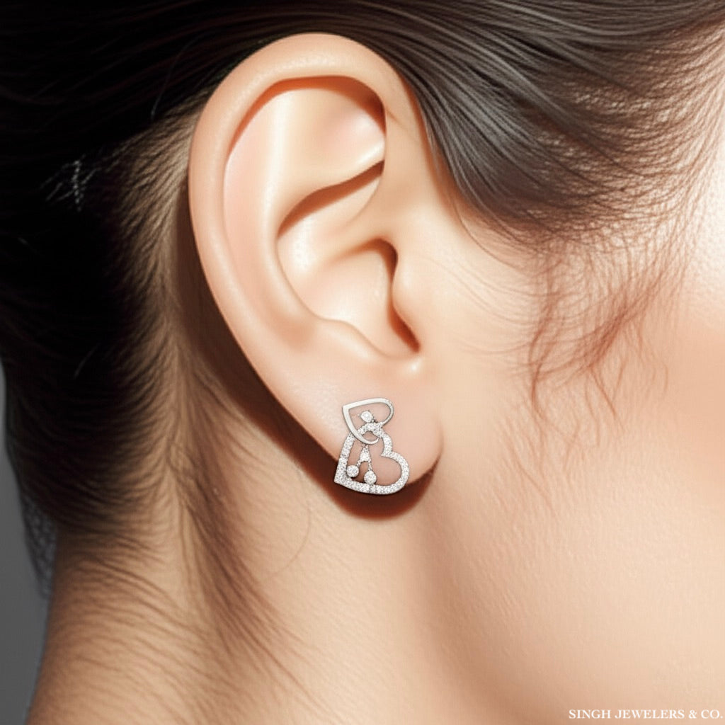 10K gold heart-shaped earrings with 1/2 carat diamonds