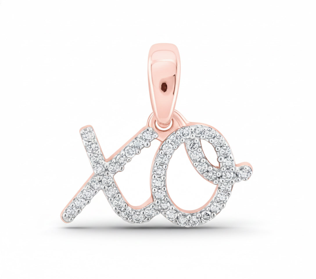 Rose gold and silver 'xo' pendant on a white background