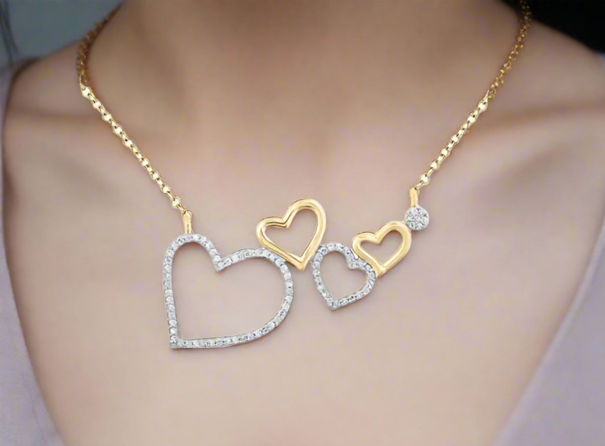 10k gold floating hearts diamond necklace with 1/6 cttw diamonds, 18-inch chain for women