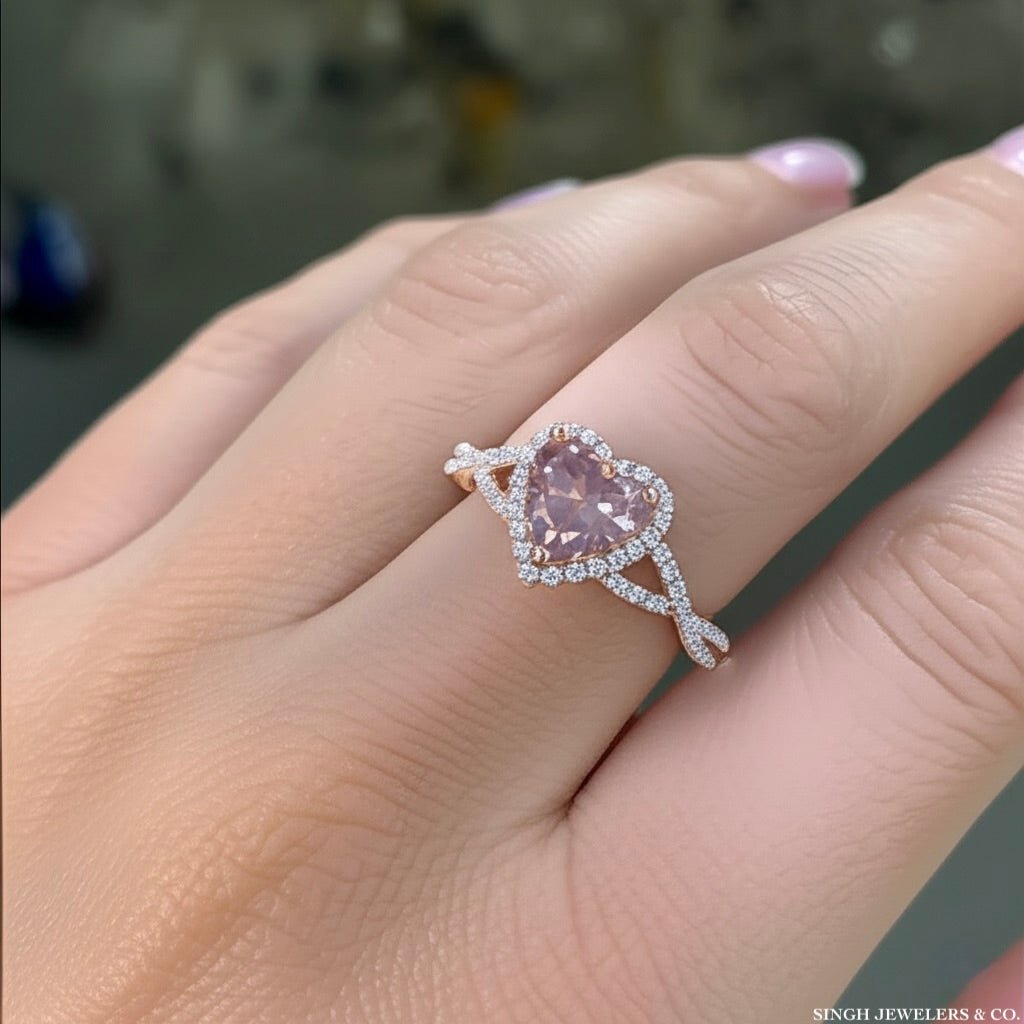 Model wearing heart morganite and diamond ring in 10K rose gold
