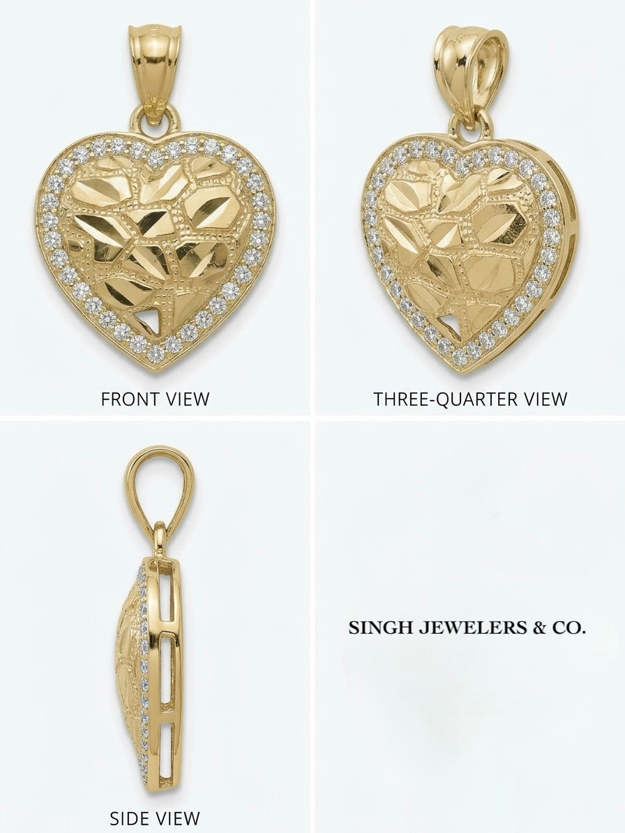 Close-up of the diamond-cut texture and round CZ stones on a gold heart charm.