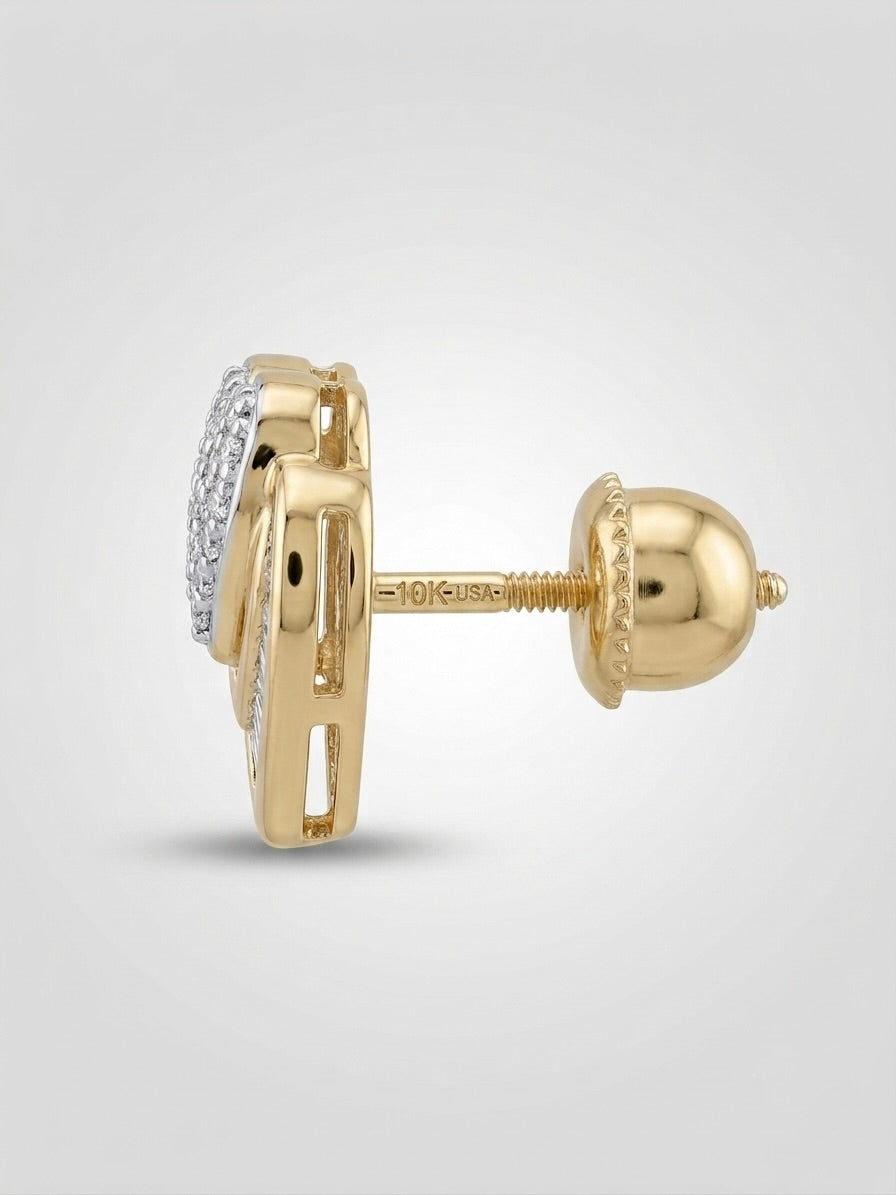 Women’s yellow gold heart stud earrings with sparkling baguette and round diamonds.