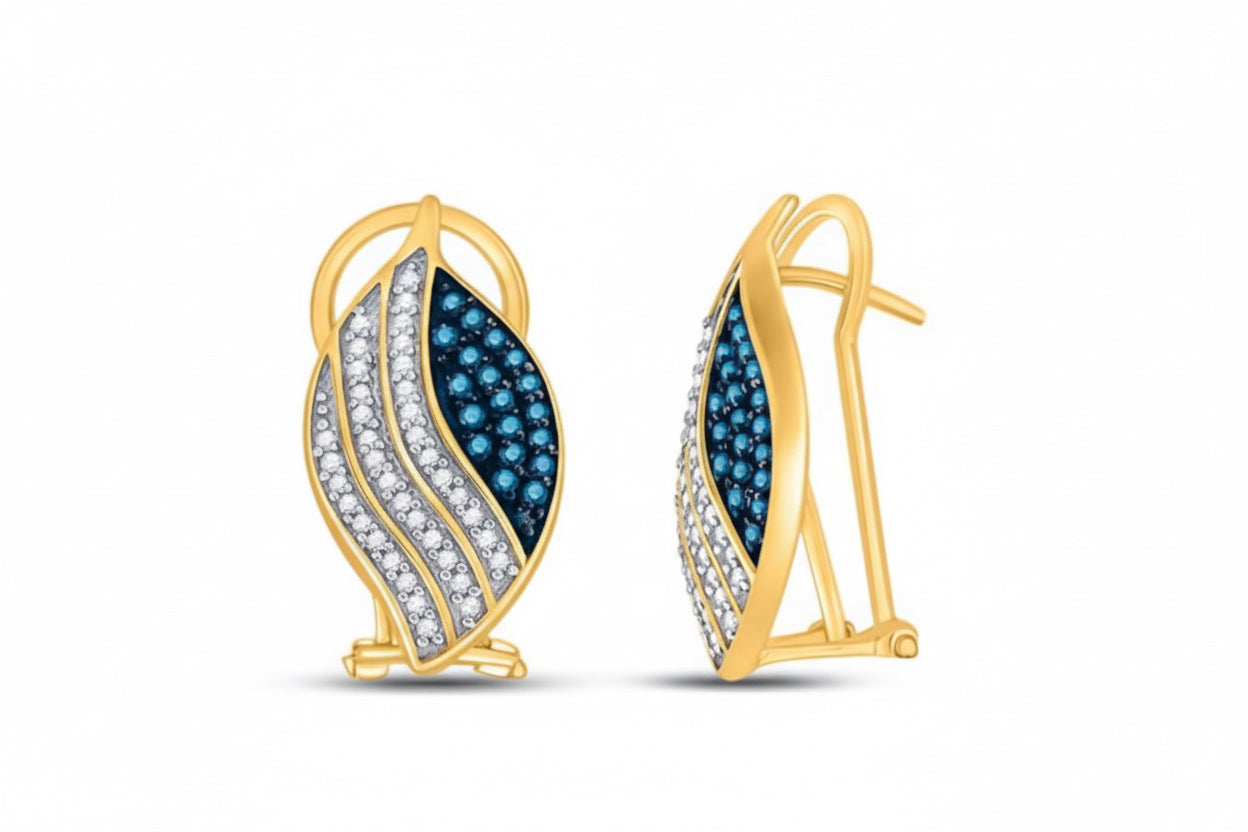 Gold earrings with blue and clear gemstones on a white background