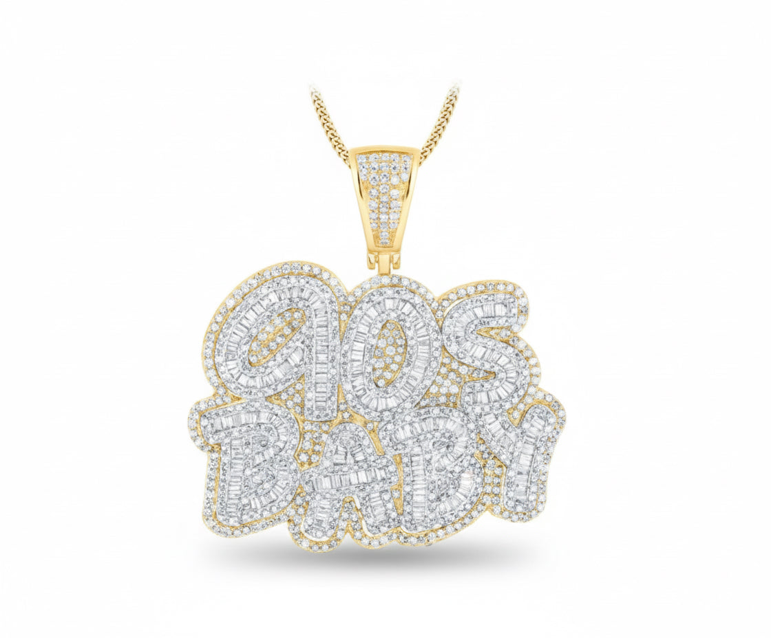 Gold and diamond-encrusted '90s' pendant on a white background