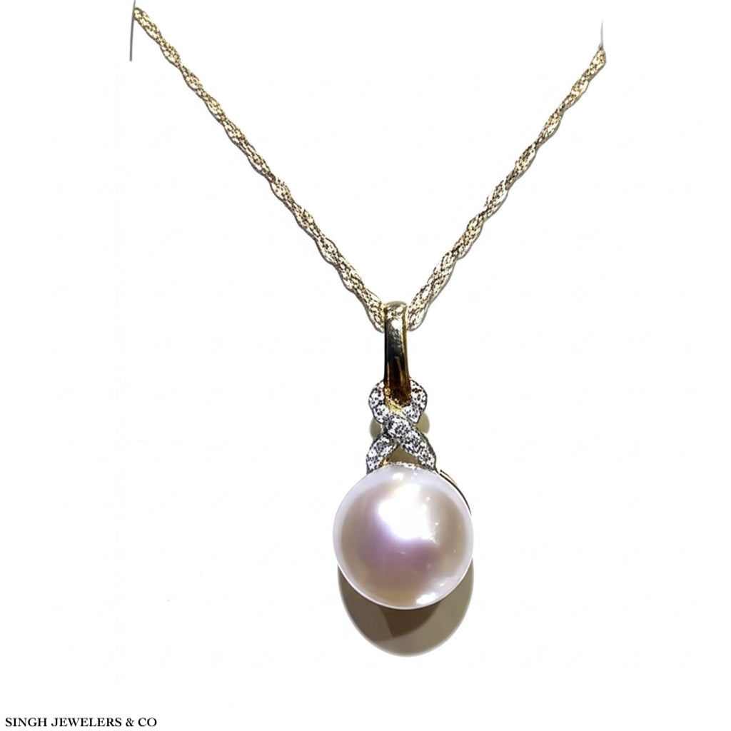 10k yellow gold infinity necklace with freshwater pearl and diamond accents on white background