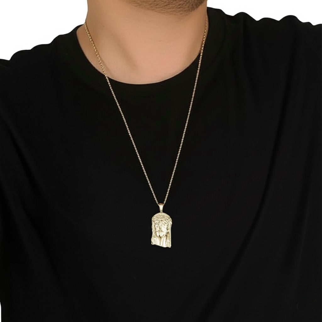 10K yellow gold matte finish Jesus pendant with detailed religious design