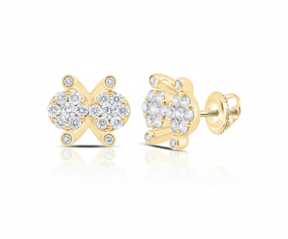 Gold earrings with diamond accents on a white background