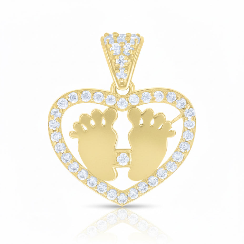 Gold pendant with heart design and baby feet silhouette on a white background
