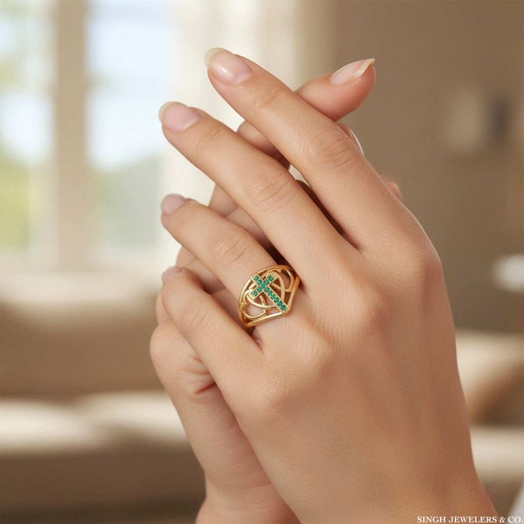 14K yellow gold ring with cross and heart and green CZ stone