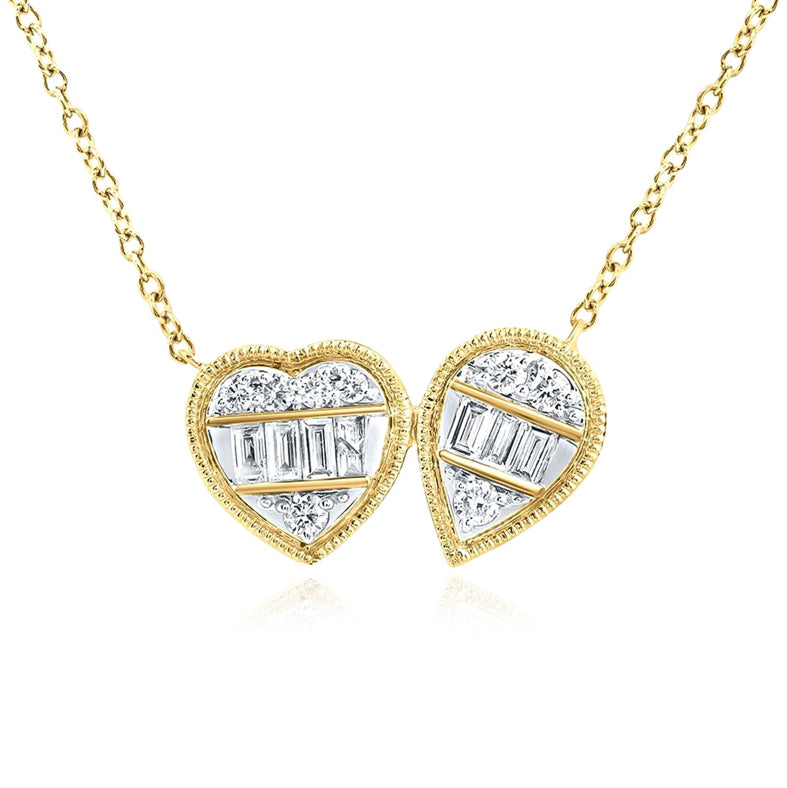 Stunning 14K yellow gold necklace featuring 1/4 Cttw diamonds in both baguette and round cuts, designed in a heart and pear shape.