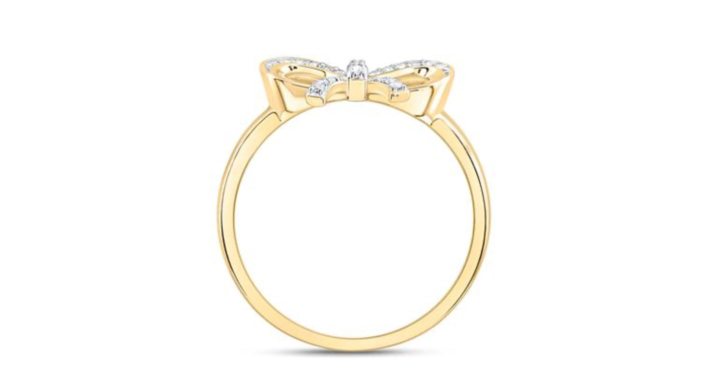 Gold ring with small diamonds on a white background