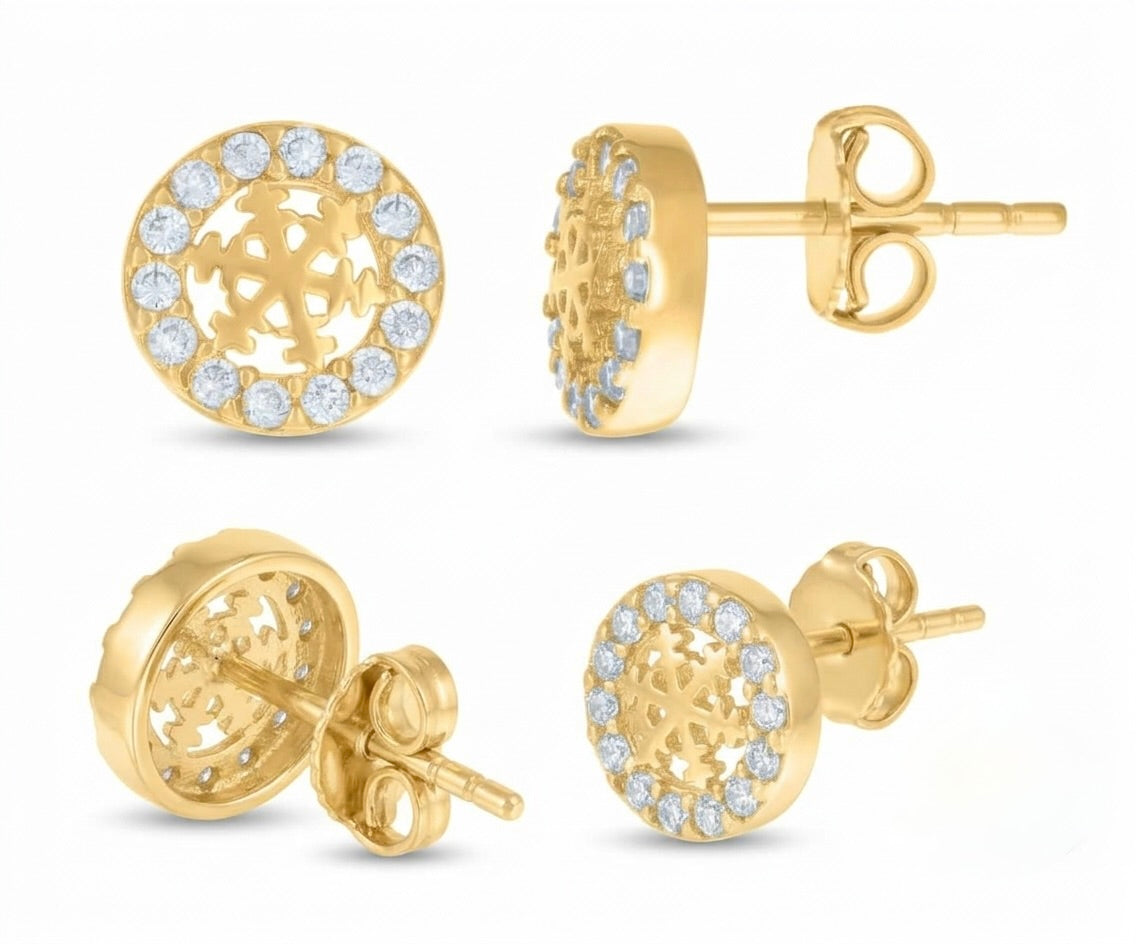 Close-up of cubic zirconia stones in gold snowflake stud earrings