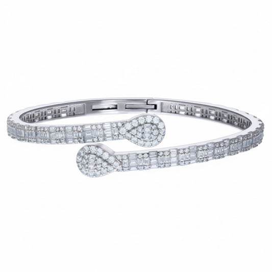 Women's sterling silver teardrop bangle with round and baguette CZ