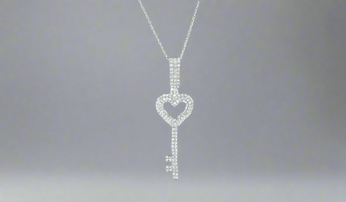 Sterling Silver Heart 5/8 Cttw Diamond Key