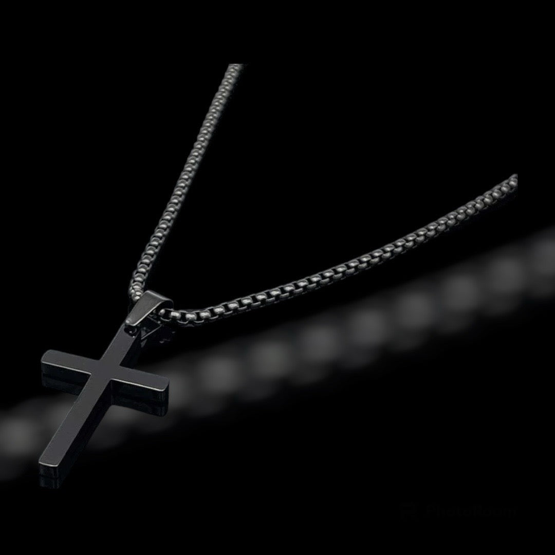 Black stainless steel cross necklace with 30mm height and 16mm width pendant. Sleek, modern design for everyday wear or special occasions.