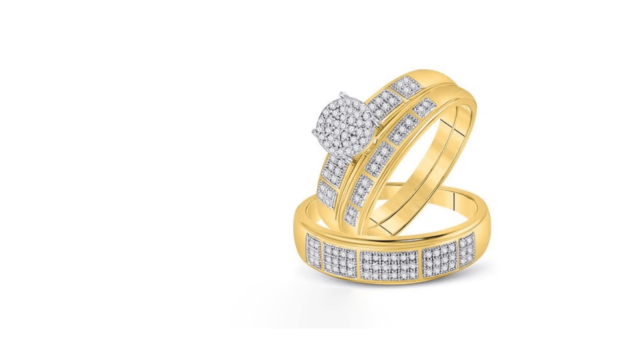 A set of two rings, one for men and one for women, featuring a gold band with round diamonds set in them.