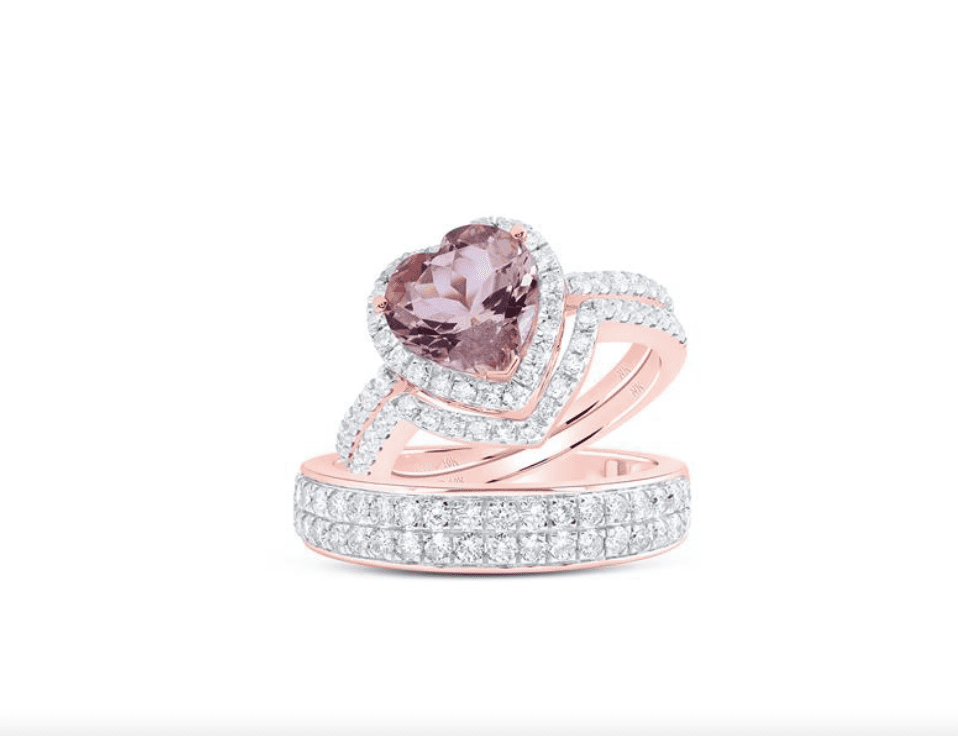 A bridal diamond ring set with a heart-shaped morganite center stone surrounded by smaller diamonds, on a male band.