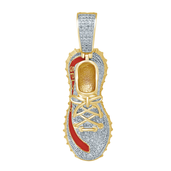 A 10K yellow gold diamond sneaker shoe pendant with a half carat total weight of diamonds.