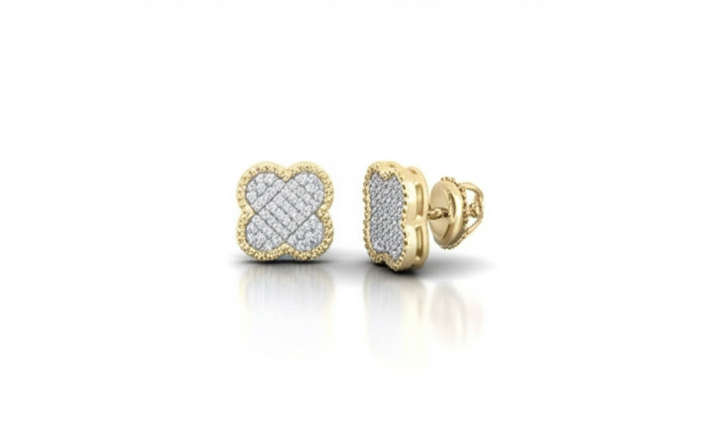 Gold earrings with diamond accents on a white background