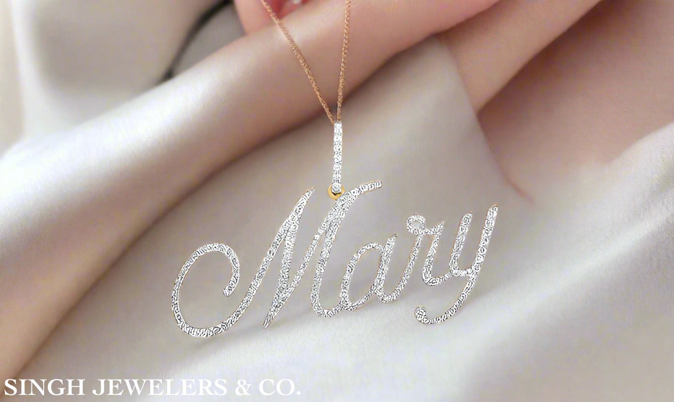 Personalized diamond name pendant with Mary engraving in 10K yellow gold