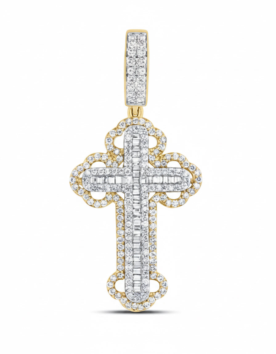 Gold and silver cross pendant with diamonds on a white background