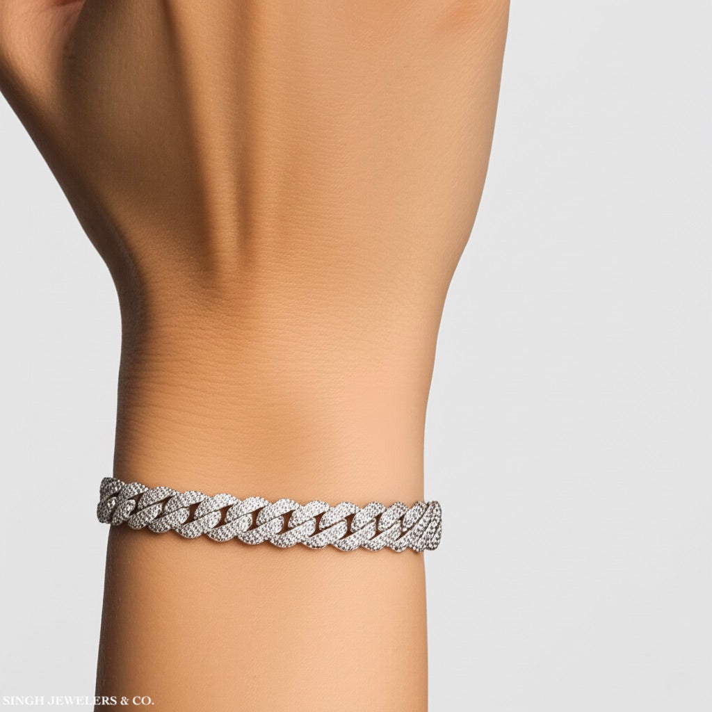 Model wearing 6.5 inch sterling silver moissanite Cuban link bracelet on wrist