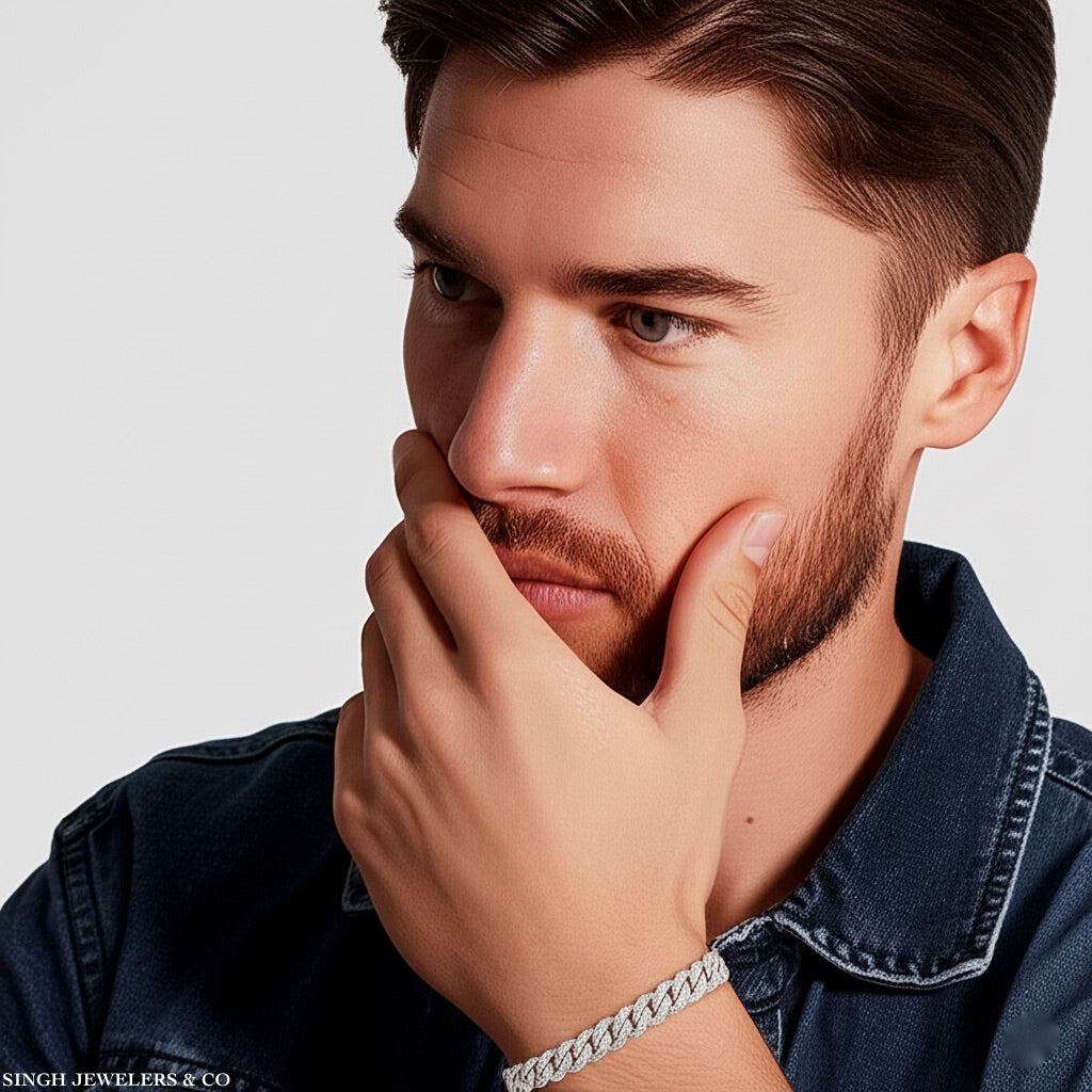 Model wearing 7 inch sterling silver Cuban bracelet with moissanite