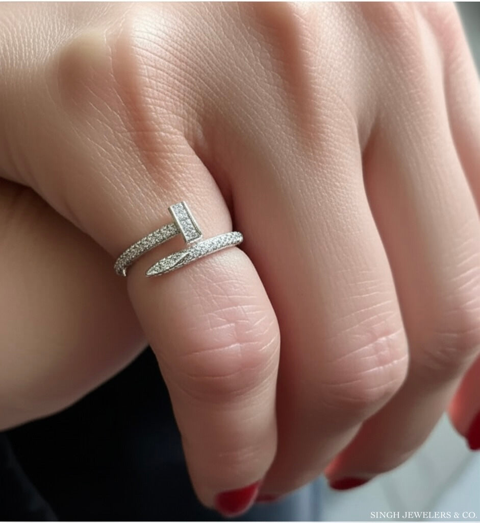 925 silver cubic zirconia nail ring paired with fashion jewelry on female model