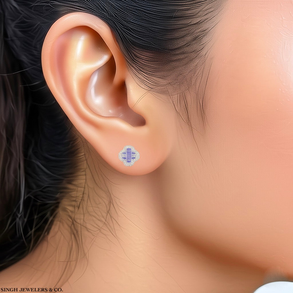 Model wearing sterling silver clover earrings with 0.37 ct purple and white moissanite stones