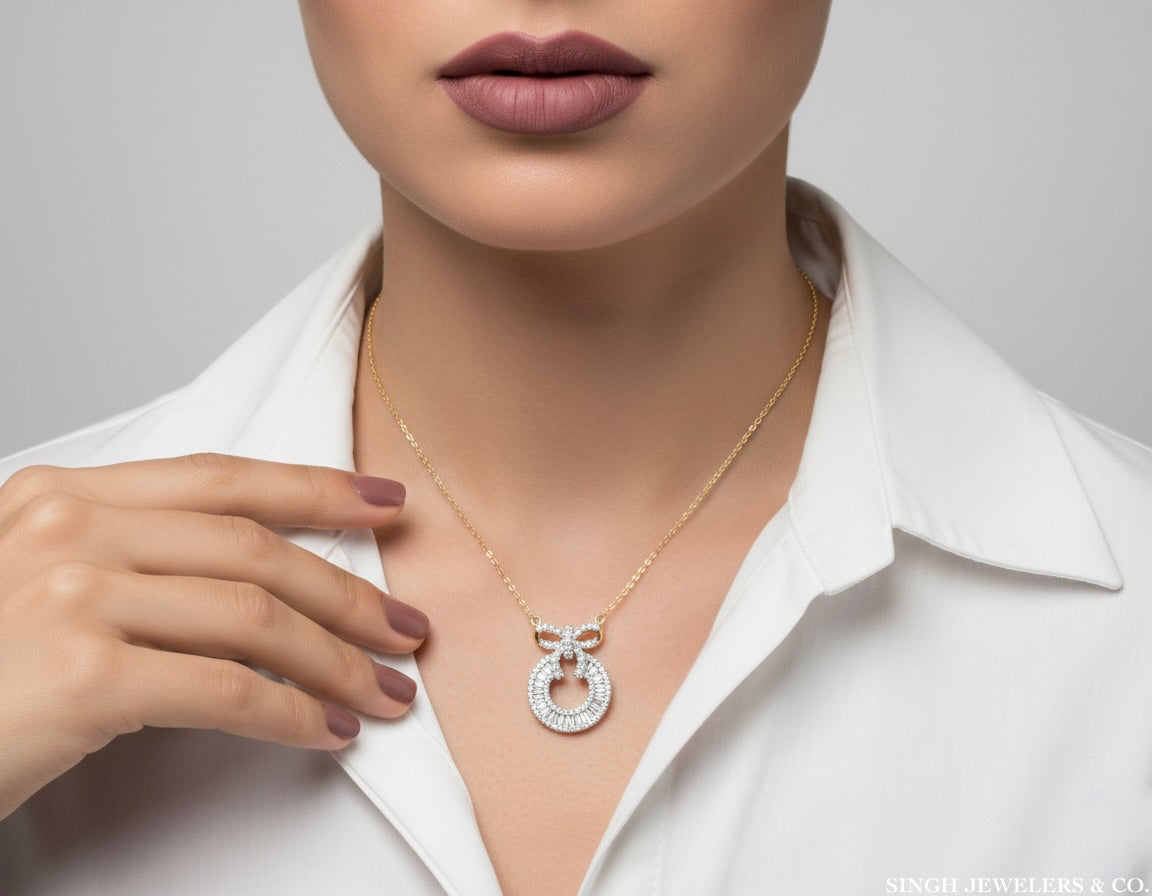 Women’s 14K gold diamond bow necklace