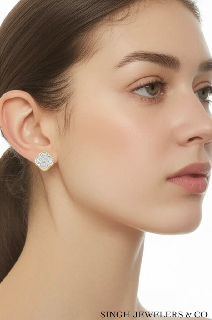 Woman wearing natural diamond clover earrings in 10k yellow gold, 1/6CTW, perfect gift for any occasion