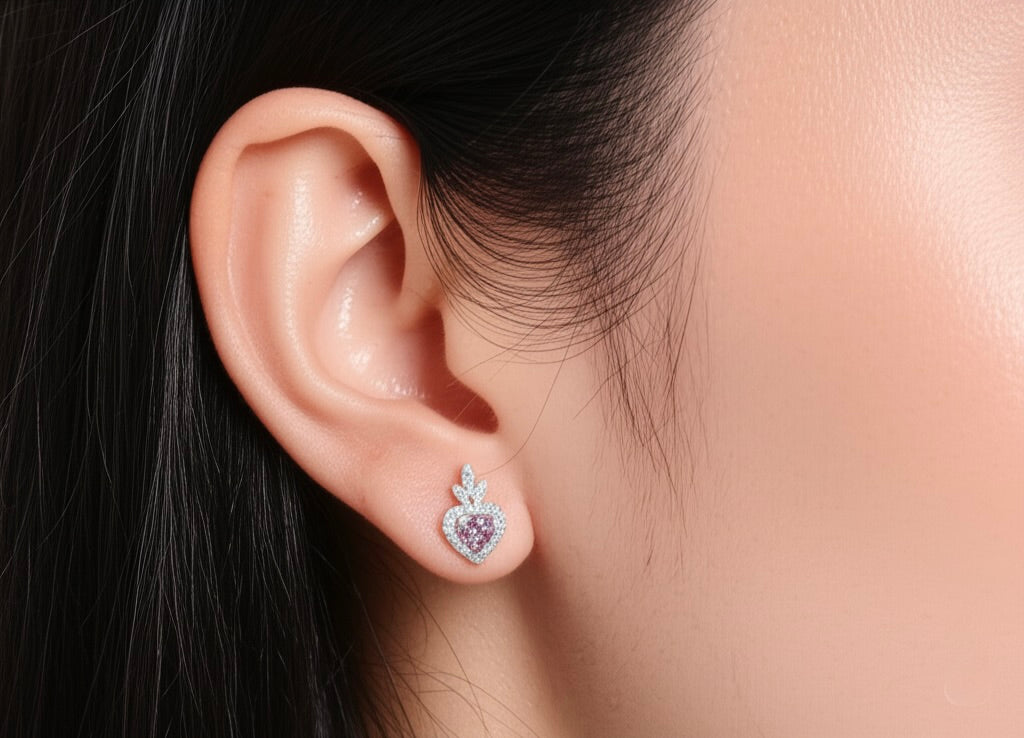 Model outdoors wearing 10K rose gold earrings with morganite and 1/3 Cttw diamond accents