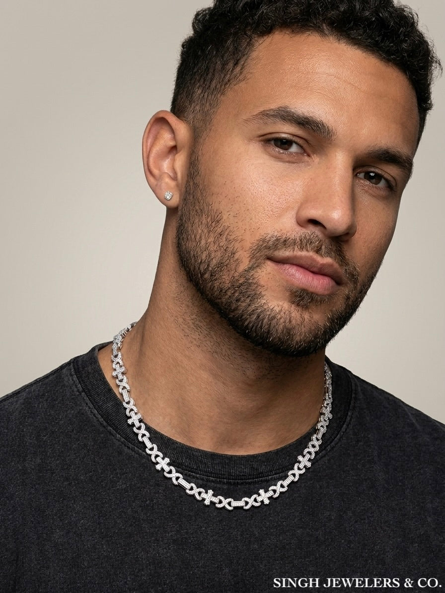 Man wearing sterling silver infinity cross moissanite necklace