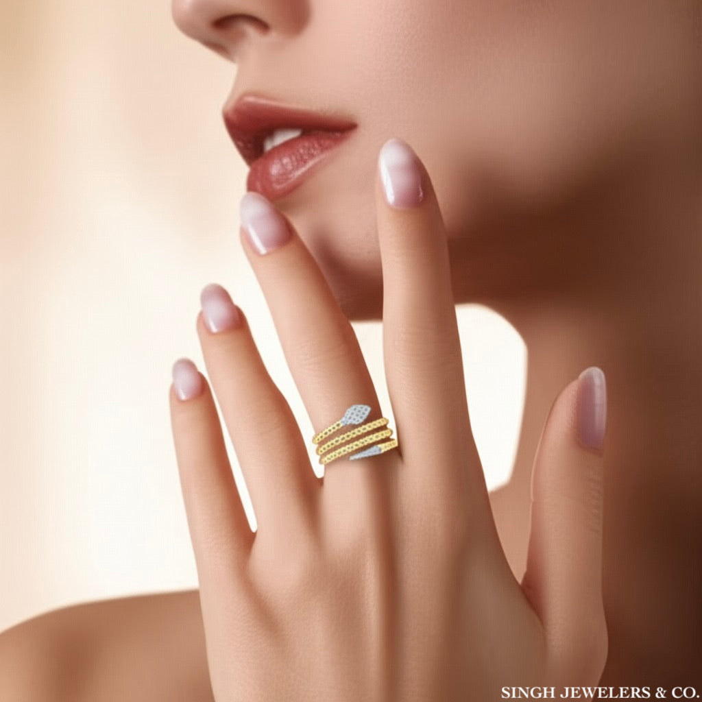 Close-up of natural diamonds on 14K yellow gold snake ring