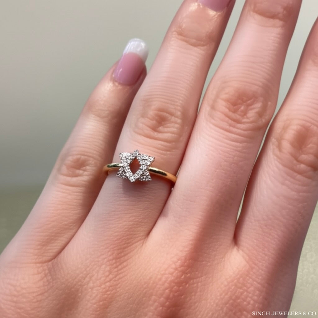 10K gold ladies ring featuring a 6-point Star of David with diamonds