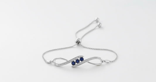 Sterling silver bolo bracelet with 1/2 CTTW synthetic blue sapphires