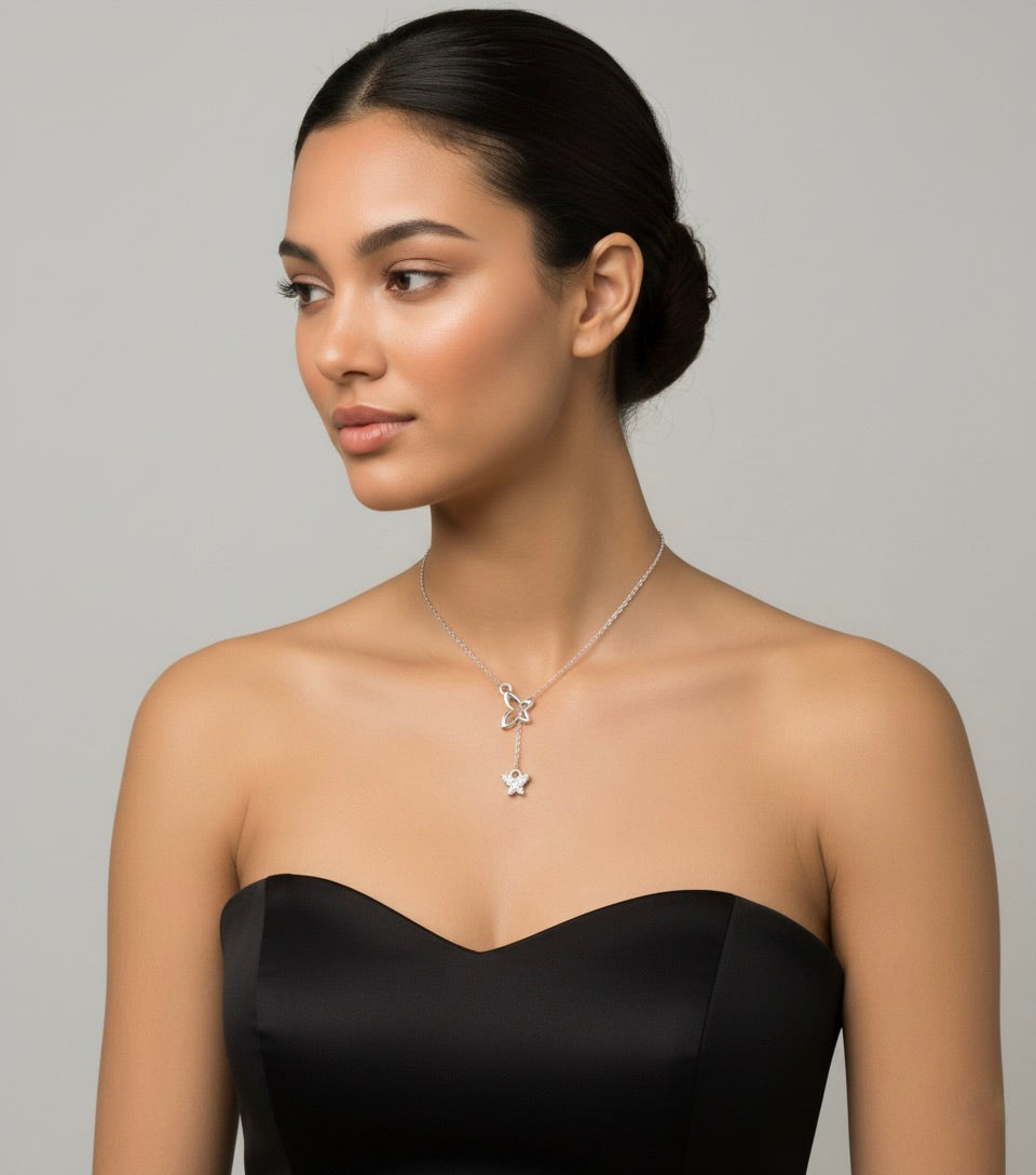 Sterling silver butterfly necklace with natural diamond accents on a delicate chain