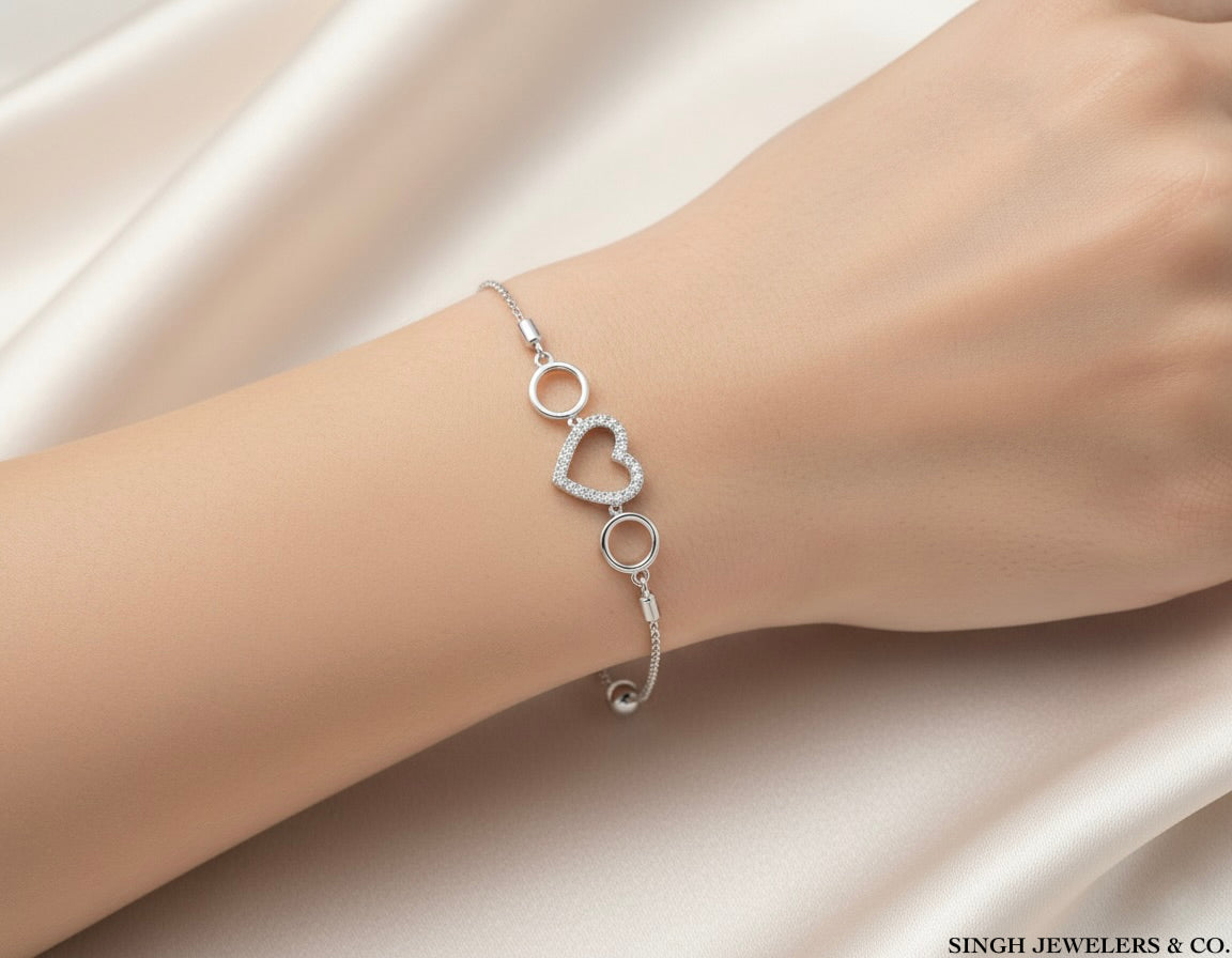 Sterling silver heart bolo bracelet with 1/20 CTTW round diamonds
