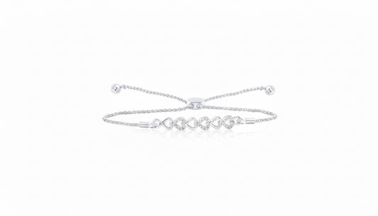 Sterling silver heart bolo bracelet with 1/10 carat round diamonds