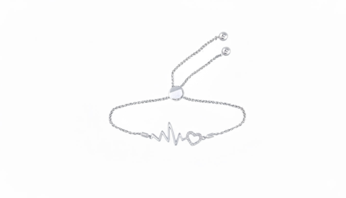Sterling silver heartbeat and heart bolo bracelet with 1/8 CTTW diamonds