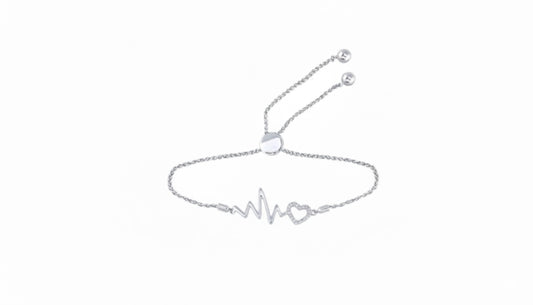 Sterling silver heartbeat and heart bolo bracelet with 1/8 CTTW diamonds