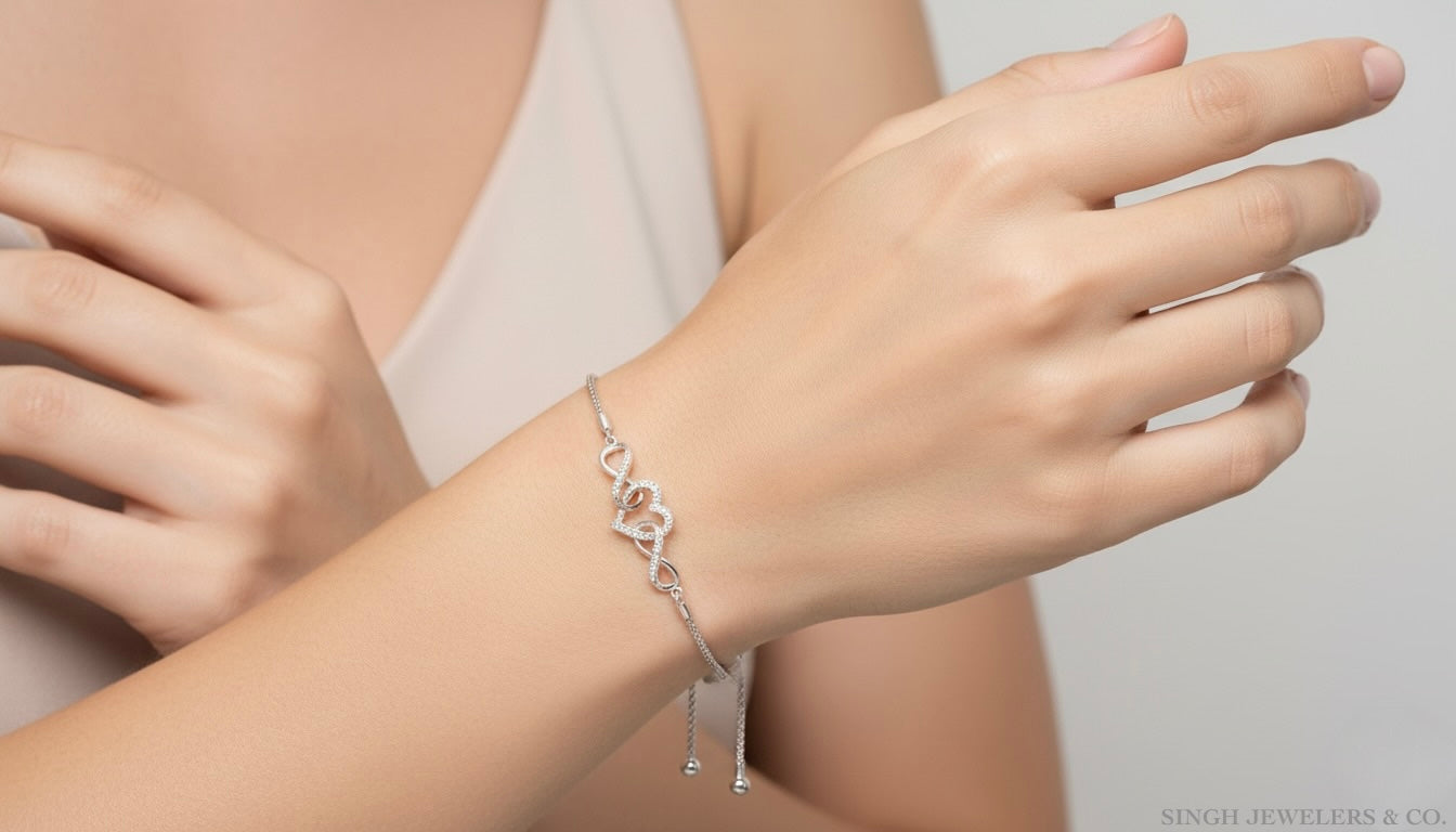 Sterling silver infinity heart bolo bracelet with 1/6 CTTW diamonds