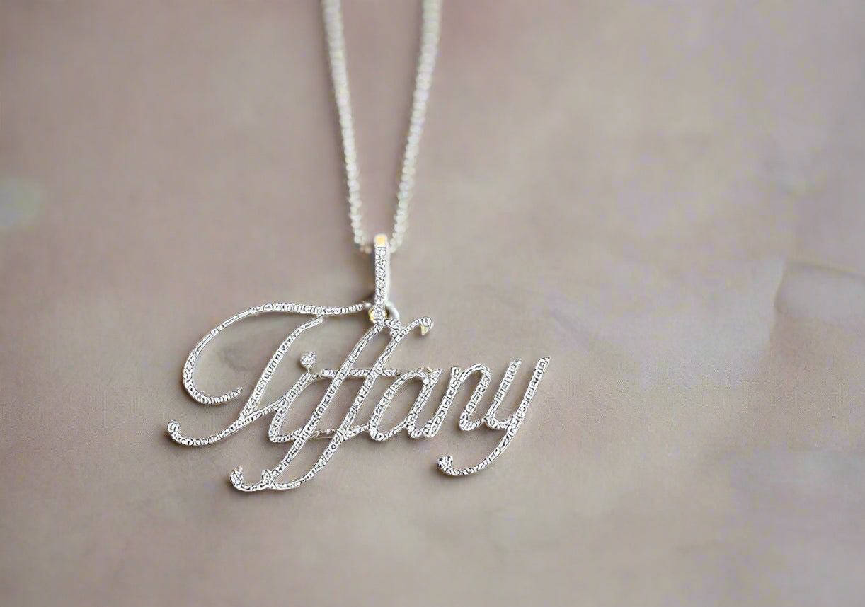 Custom name pendant in 10K yellow gold with round diamonds