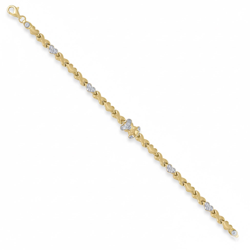 Gold bracelet with small diamonds on a white background