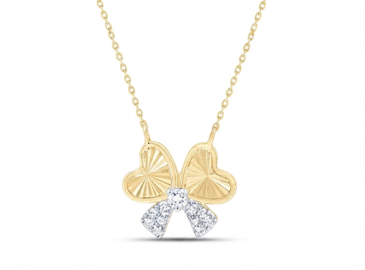 1/10 CTTW natural diamond-cut heart bow necklace in 10K yellow gold