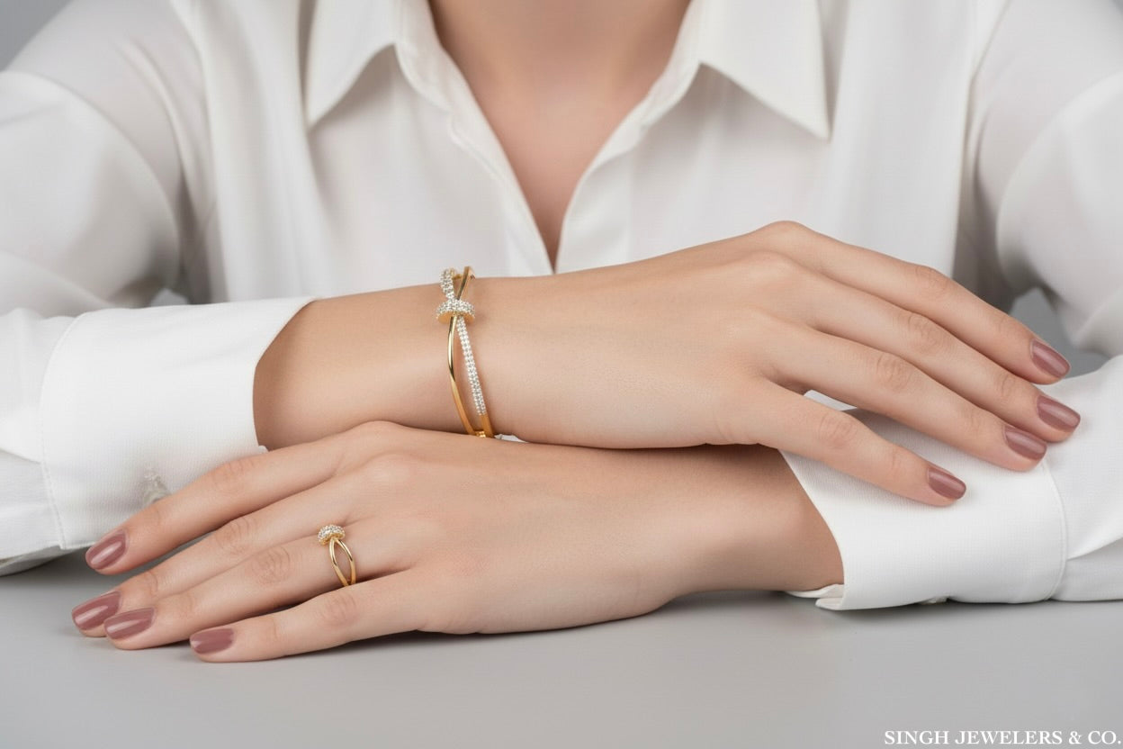 14k yellow gold bangle on woman